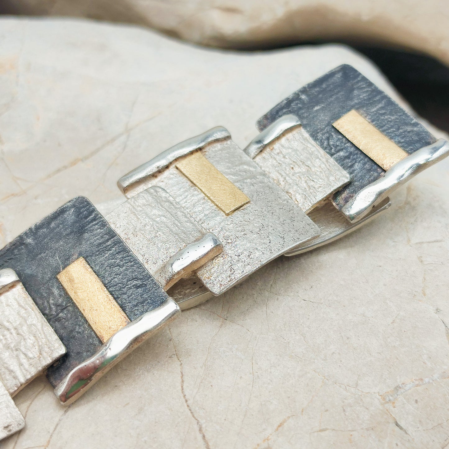Handmade bracelet by Audar in silver with 24K gold details