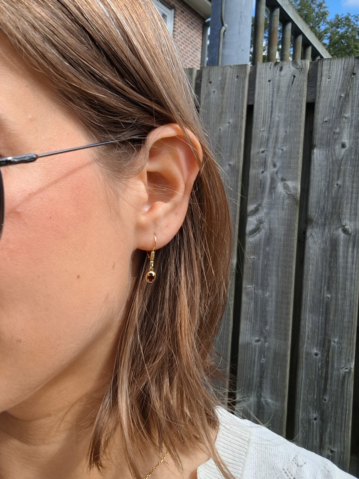 Elegant dangles with Garnet in 14K gold