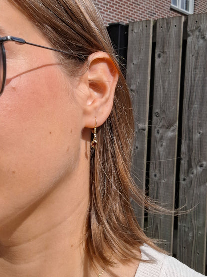Elegant dangles with Garnet in 14K gold