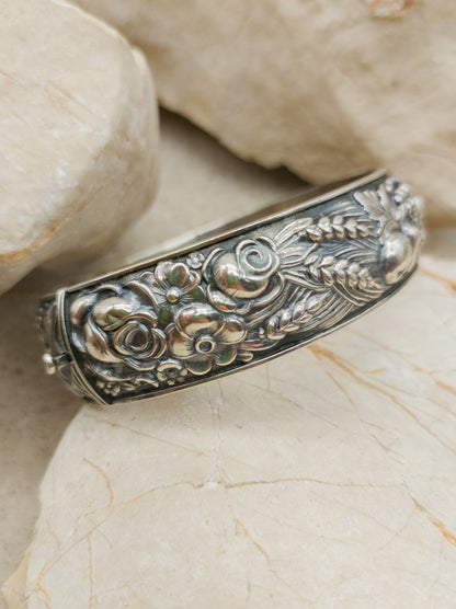 Vintage portugese silver repoussé bracelet with harvest theme flower detail