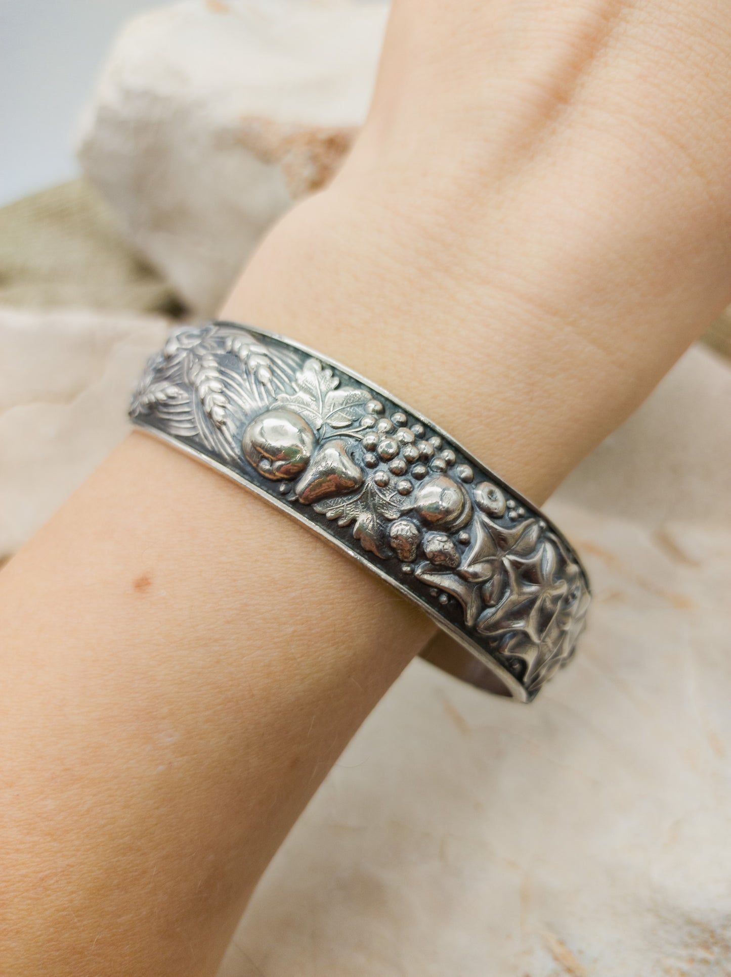 Vintage portugese silver repoussé bracelet with harvest theme on arm