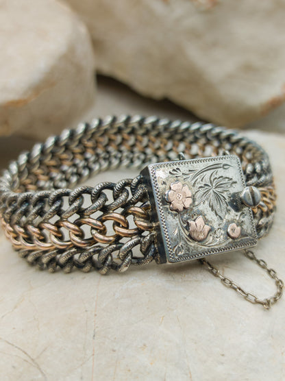 Victorian Silver repoussé chain bracelet with box clasp and rose gold plated details.