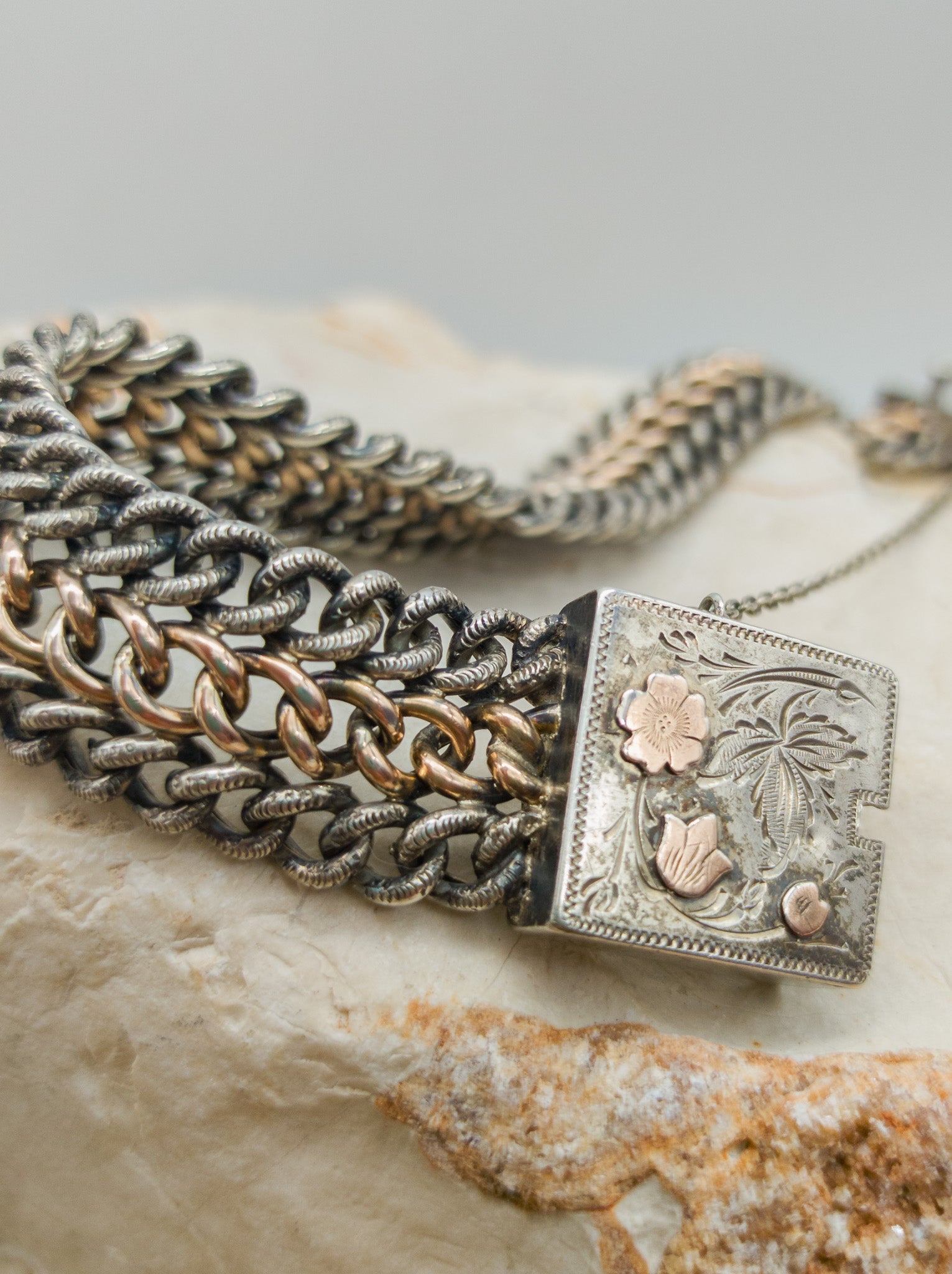 Victorian Silver repoussé chain bracelet with box clasp and rose gold plated details, zoom in picture