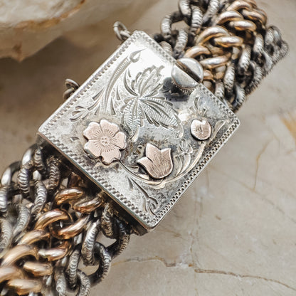 Victorian Silver repoussé chain bracelet with box clasp and rose gold plated details.