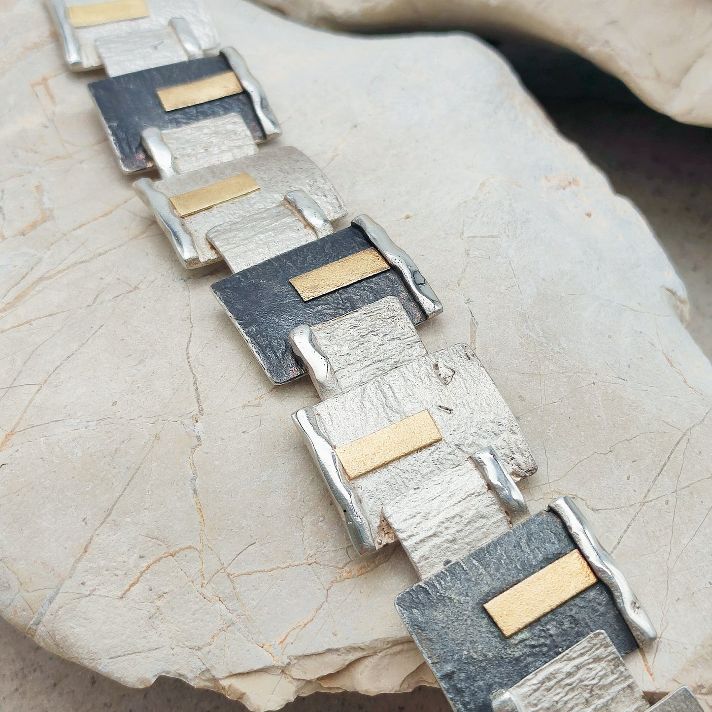 Handmade bracelet by Audar in silver with 24K gold details