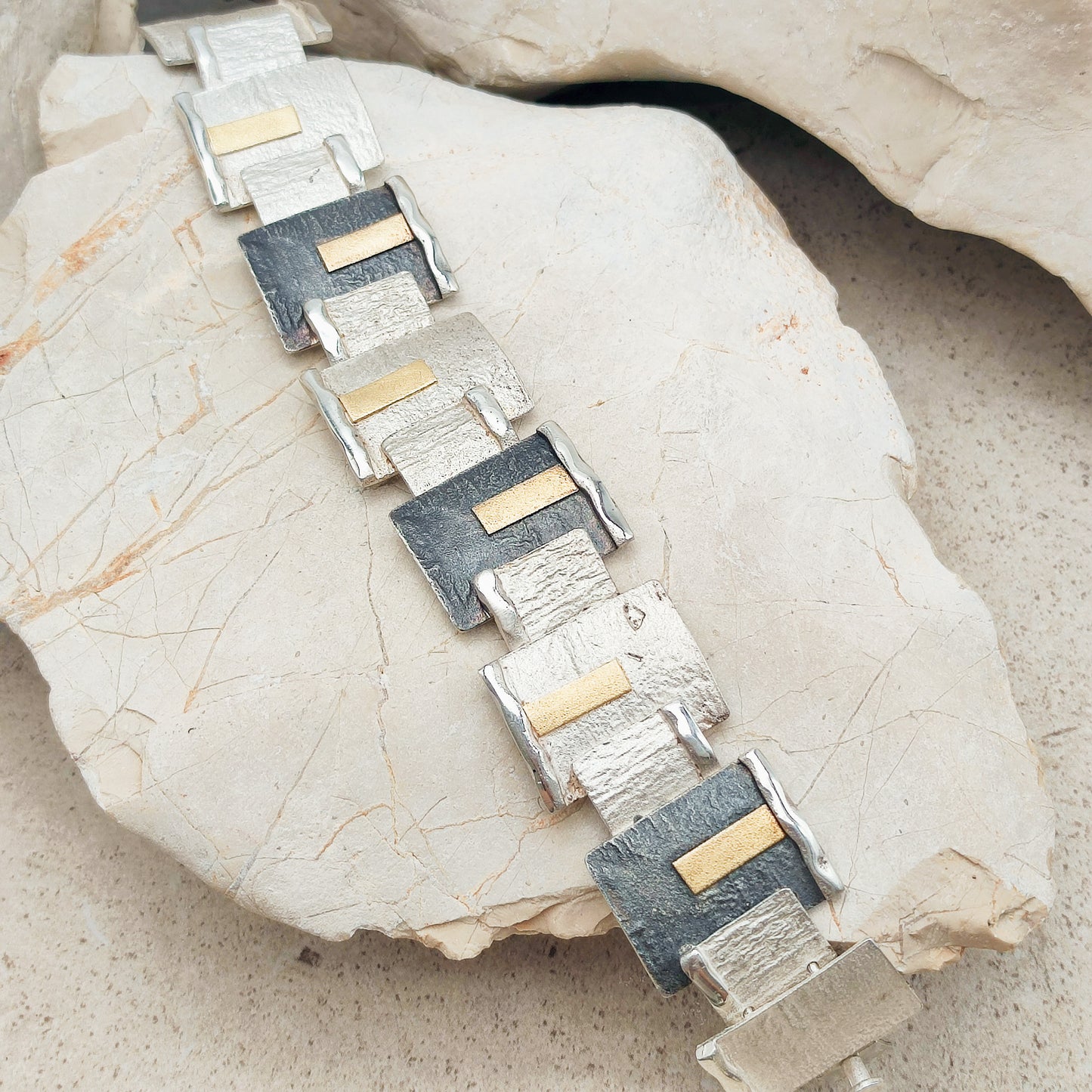 Handmade bracelet by Audar in silver with 24K gold details