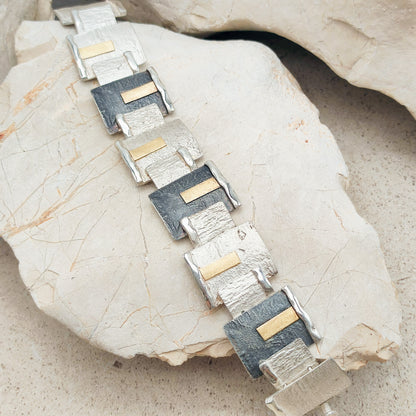 Handmade bracelet by Audar in silver with 24K gold details