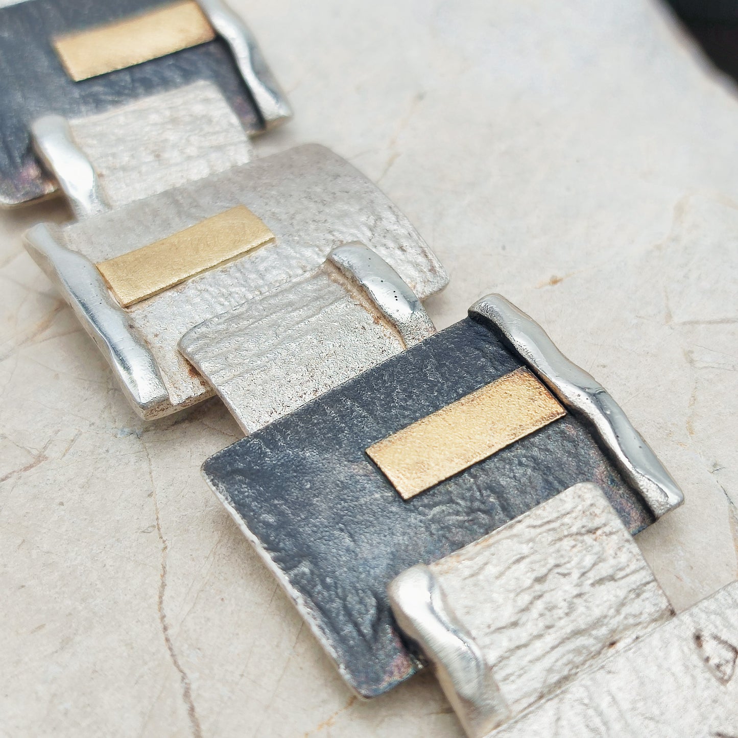 Handmade bracelet by Audar in silver with 24K gold details