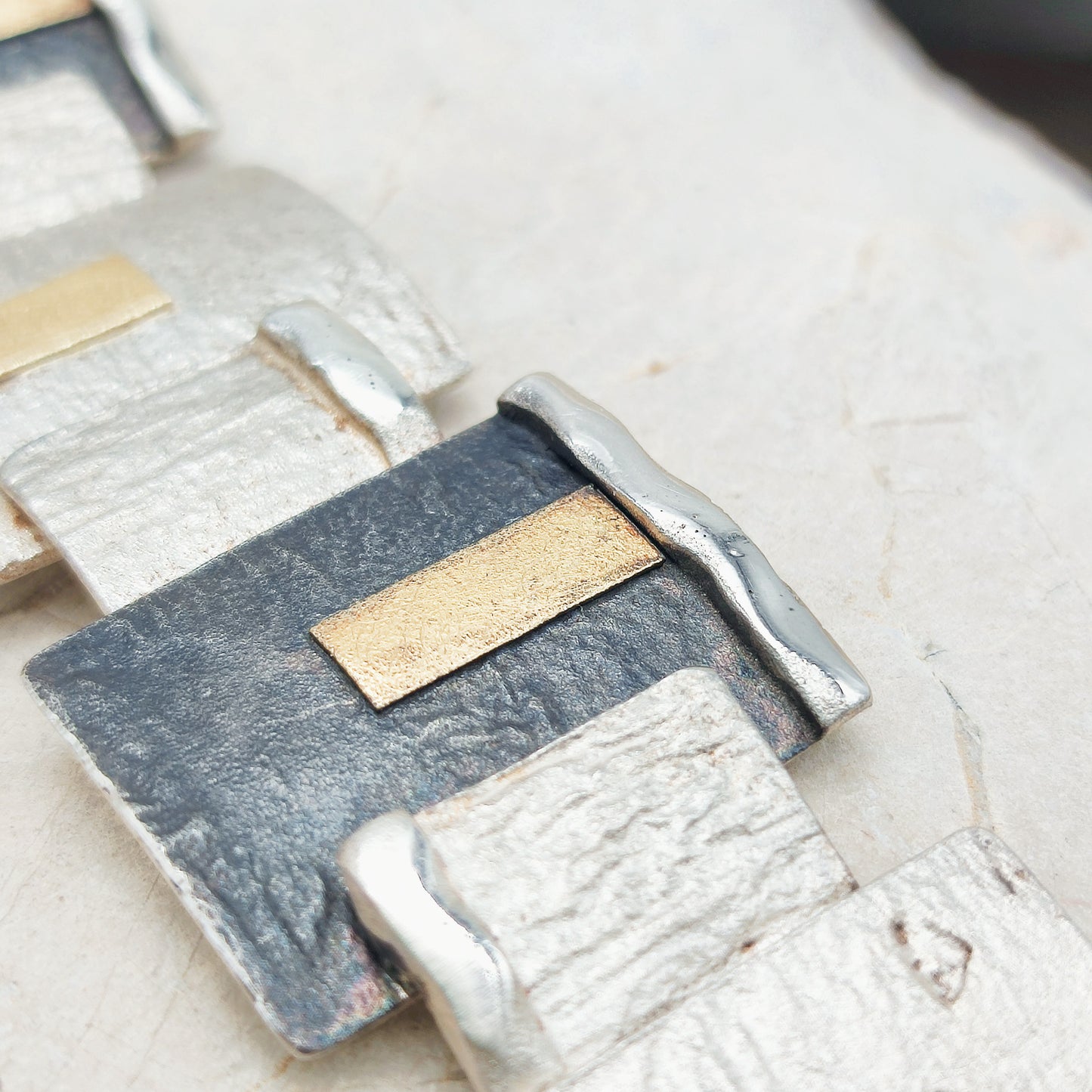 Handmade bracelet by Audar in silver with 24K gold details