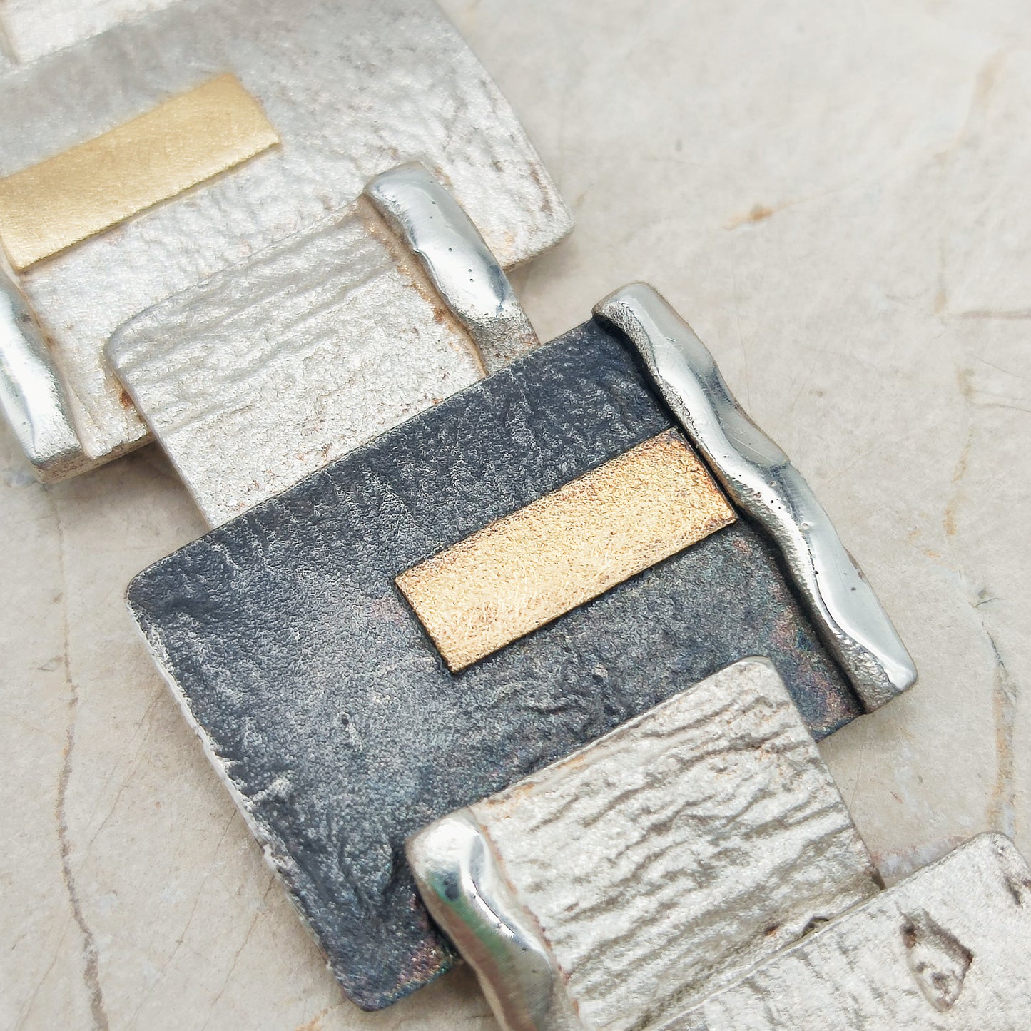 Handmade bracelet by Audar in silver with 24K gold details