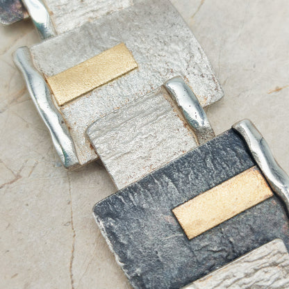 Handmade bracelet by Audar in silver with 24K gold details