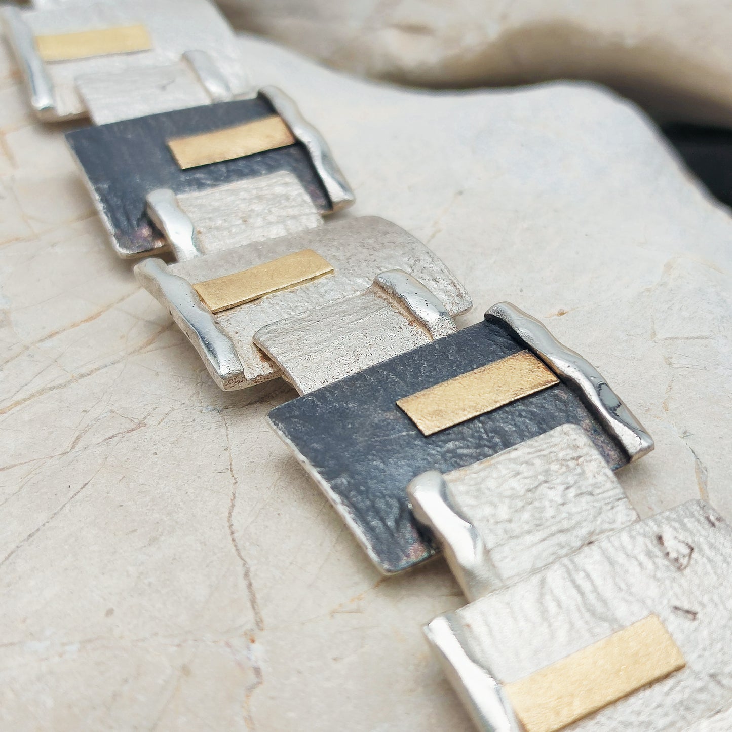 Handmade bracelet by Audar in silver with 24K gold details