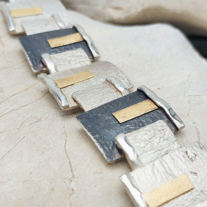 Handmade bracelet by Audar in silver with 24K gold details