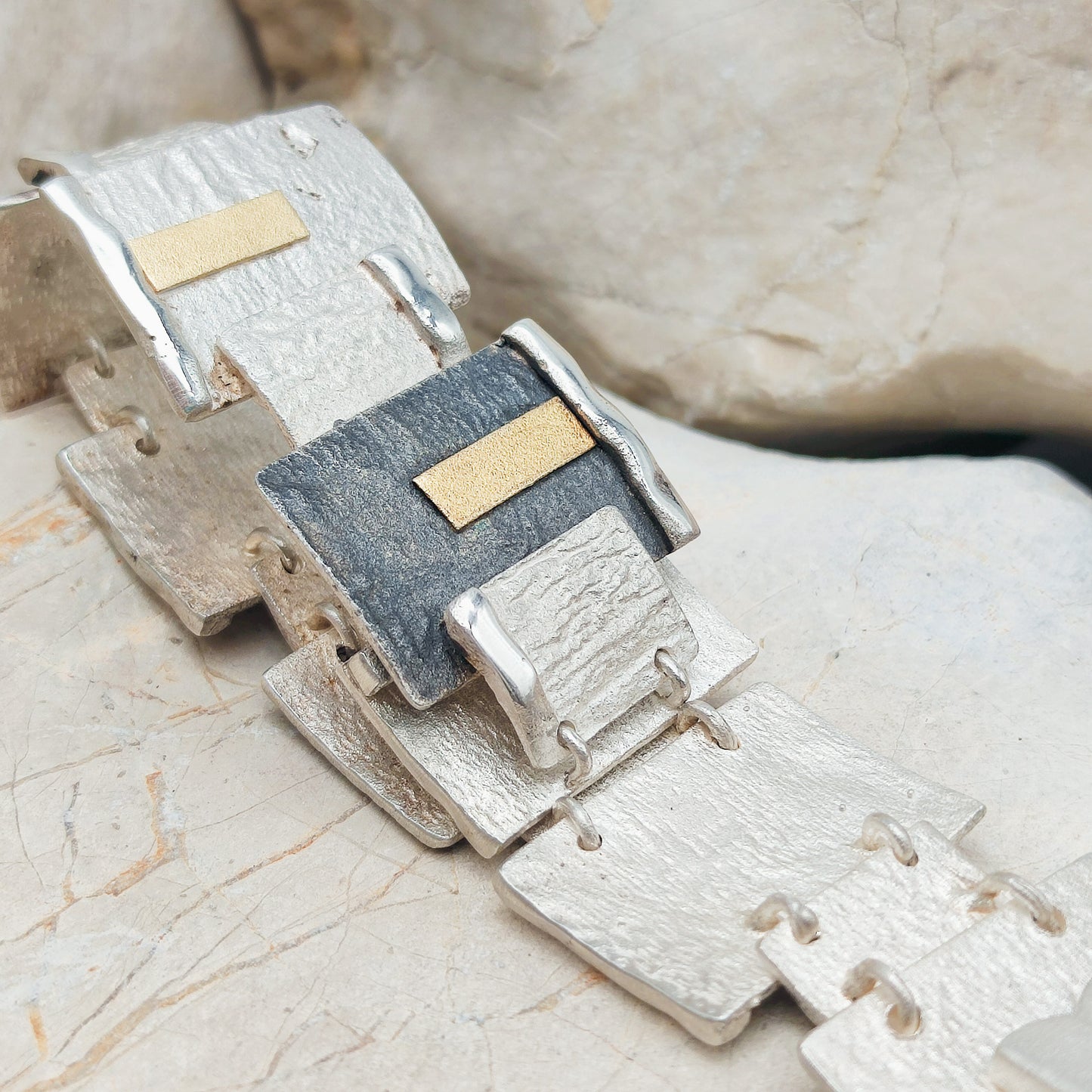 Handmade bracelet by Audar in silver with 24K gold details