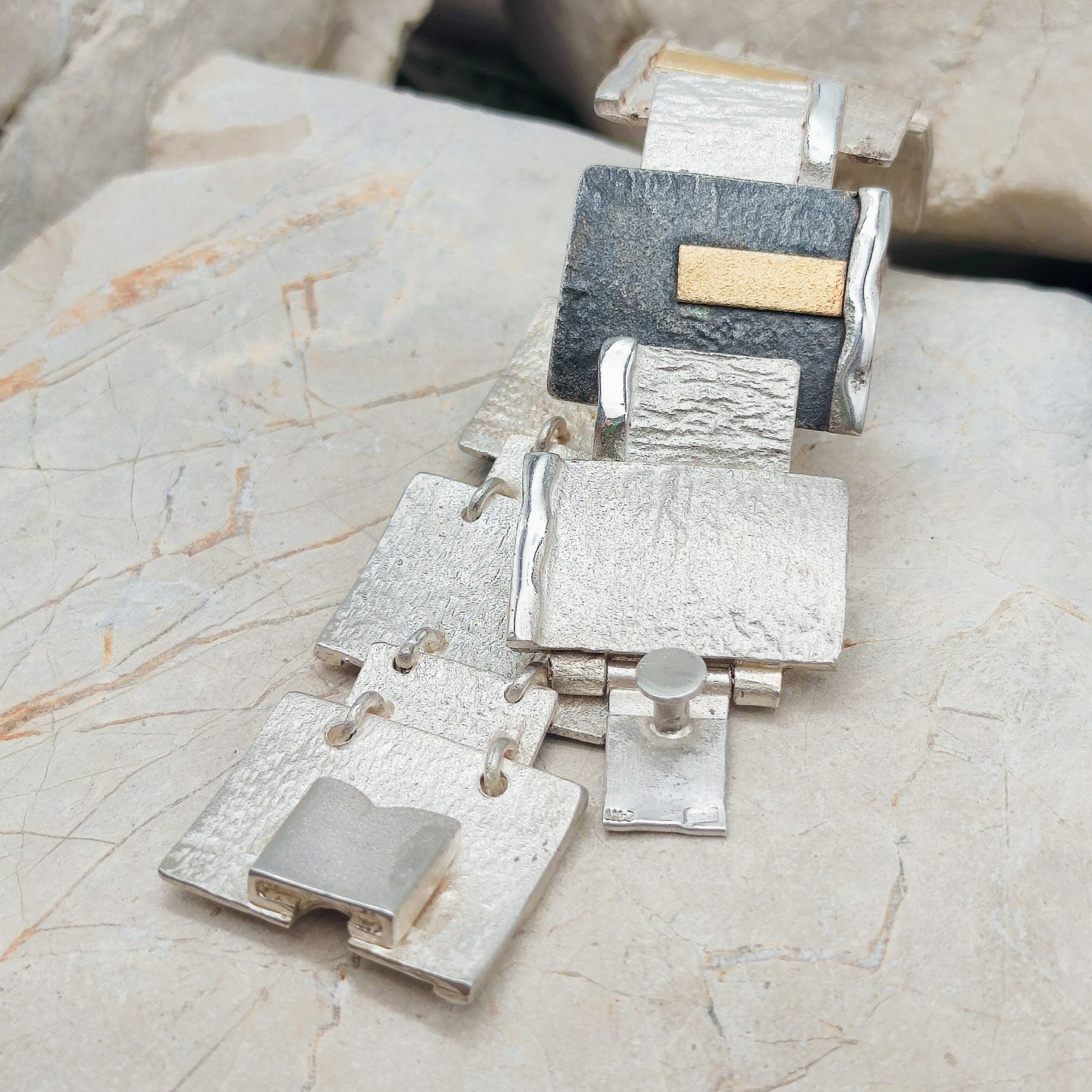 Handmade bracelet by Audar in silver with 24K gold details