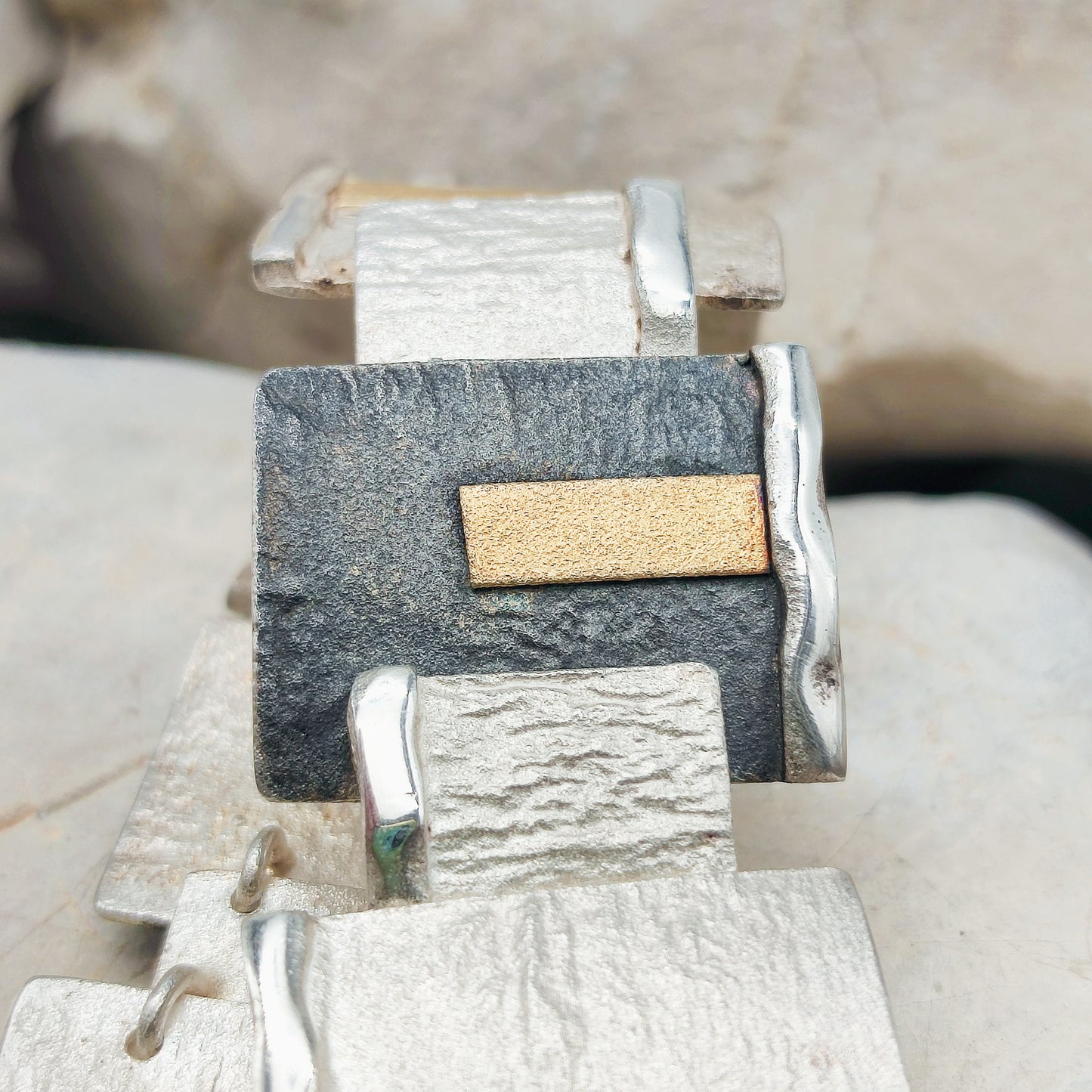 Handmade bracelet by Audar in silver with 24K gold details