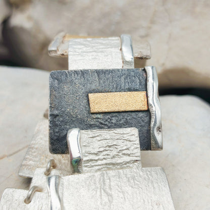 Handmade bracelet by Audar in silver with 24K gold details