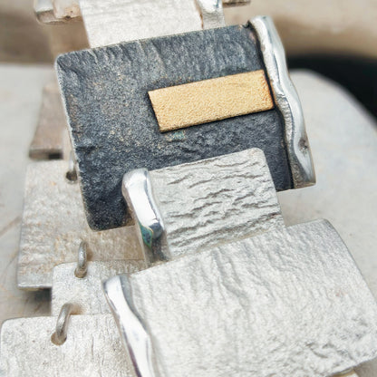 Handmade bracelet by Audar in silver with 24K gold details
