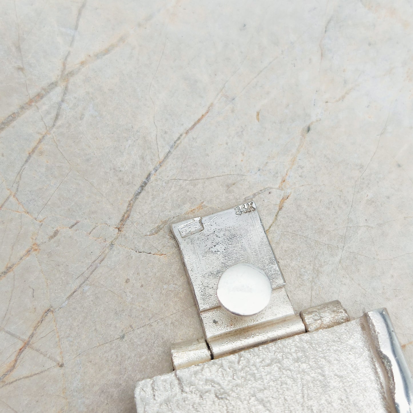 Handmade bracelet by Audar in silver with 24K gold details