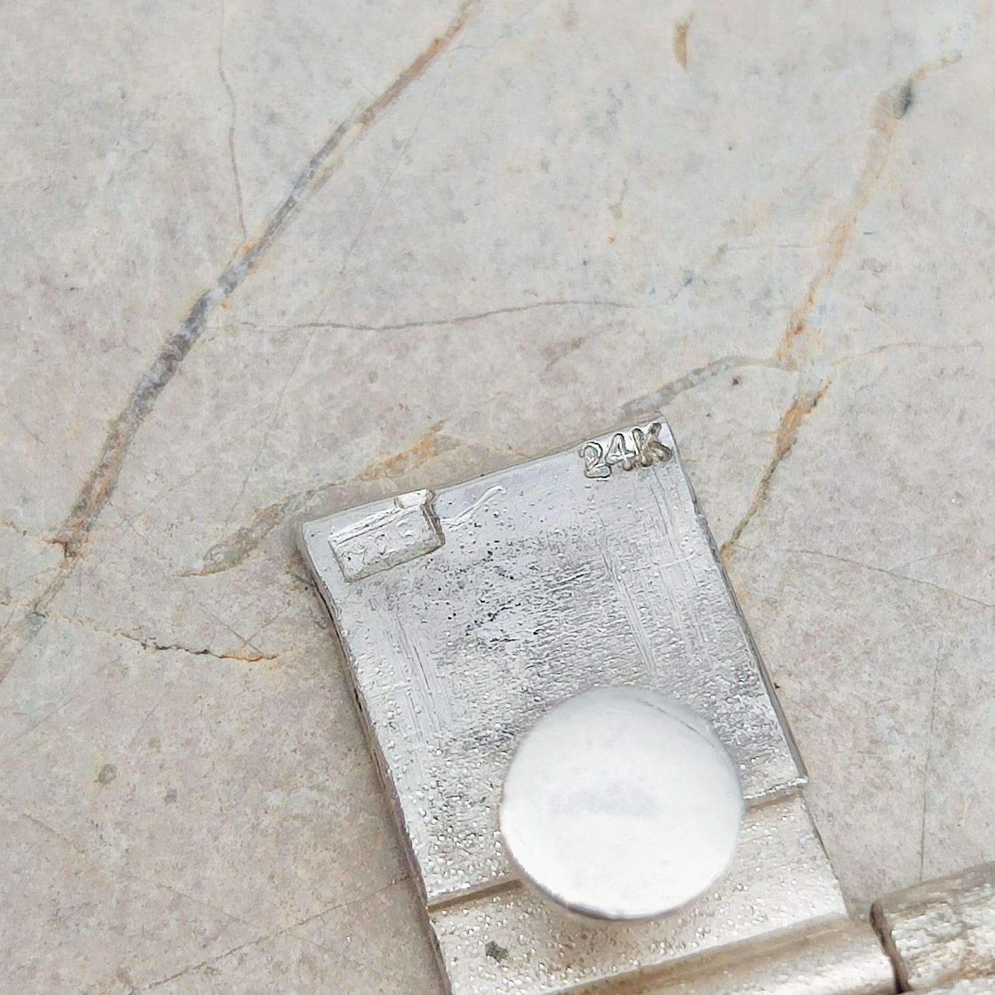 Handmade bracelet by Audar in silver with 24K gold details