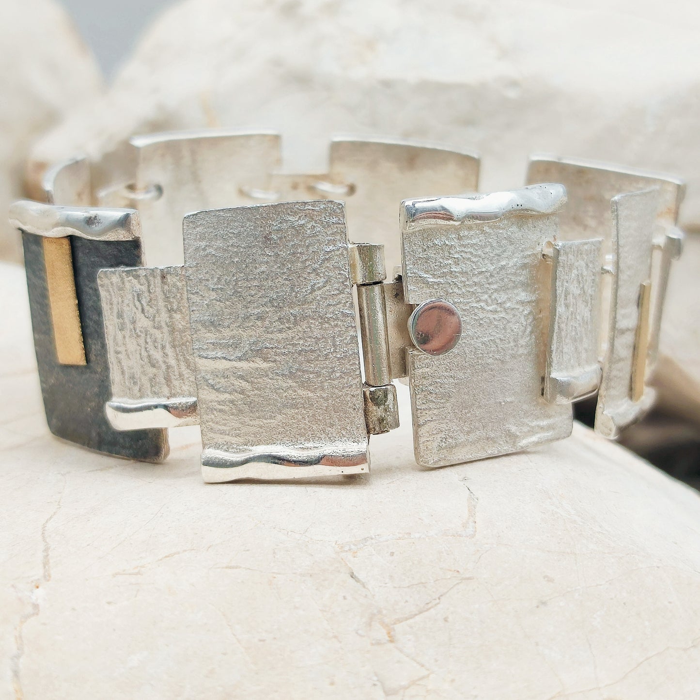 Handmade bracelet by Audar in silver with 24K gold details