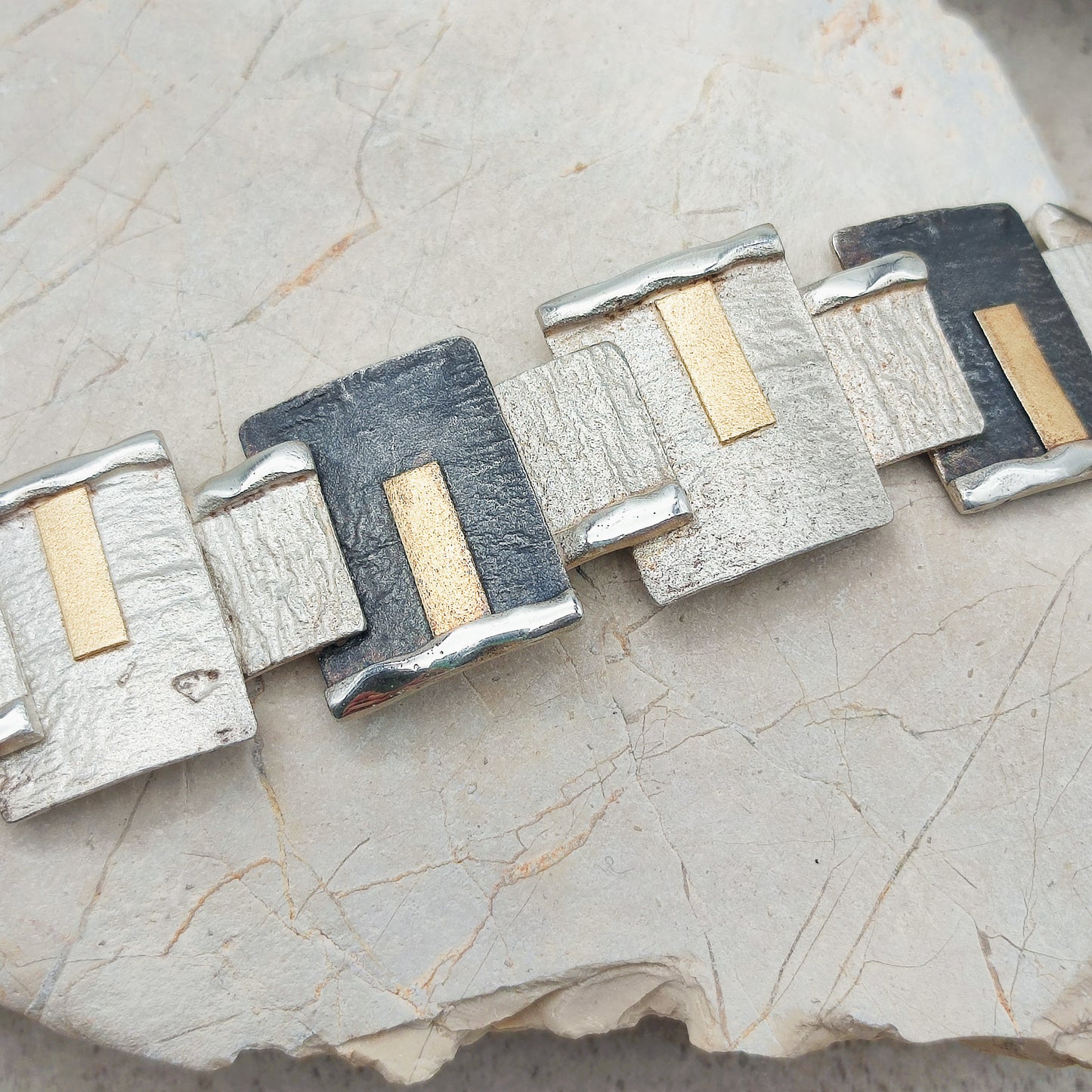 Handmade bracelet by Audar in silver with 24K gold details