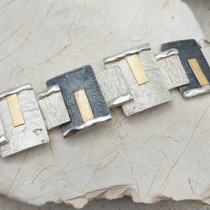 Handmade bracelet by Audar in silver with 24K gold details