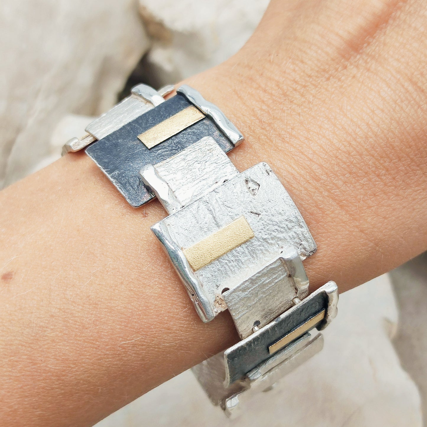 Handmade bracelet by Audar in silver with 24K gold details