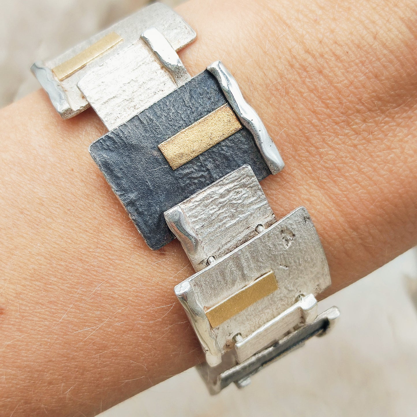 Handmade bracelet by Audar in silver with 24K gold details