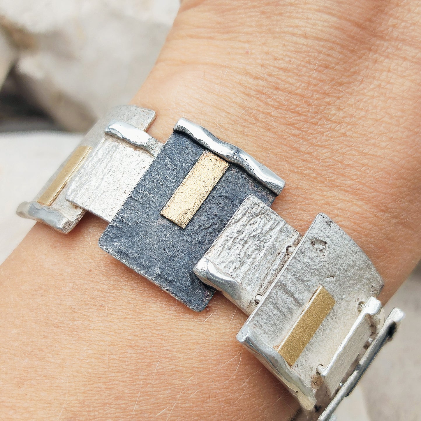 Handmade bracelet by Audar in silver with 24K gold details