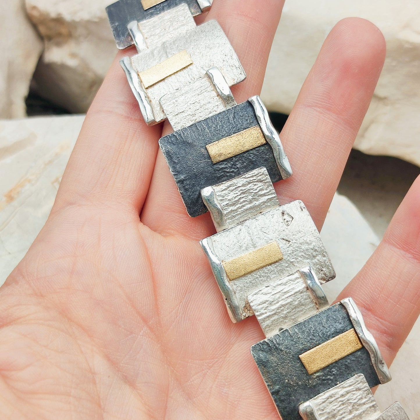 Handmade bracelet by Audar in silver with 24K gold details