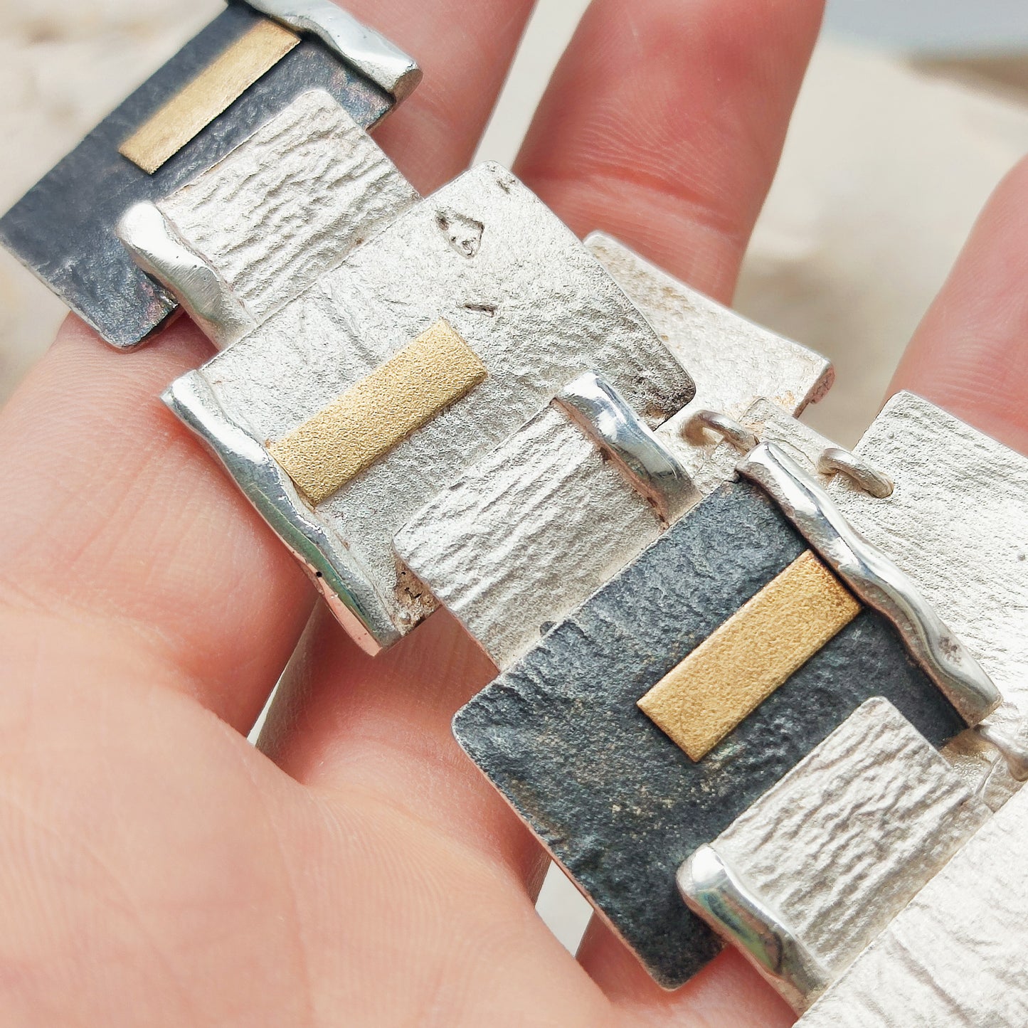 Handmade bracelet by Audar in silver with 24K gold details