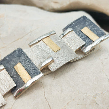 Handmade bracelet by Audar in silver with 24K gold details