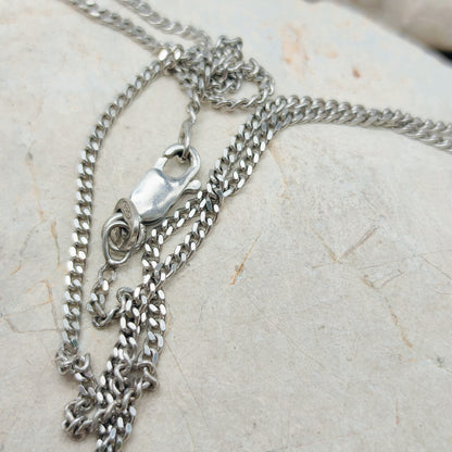 Handmade pendant by Audar in silver with 24K gold details