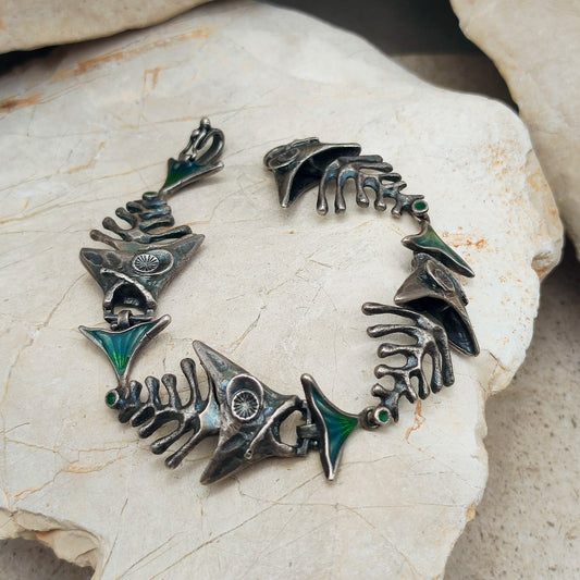 Silver Modernist fish bracelet by UnoAErre