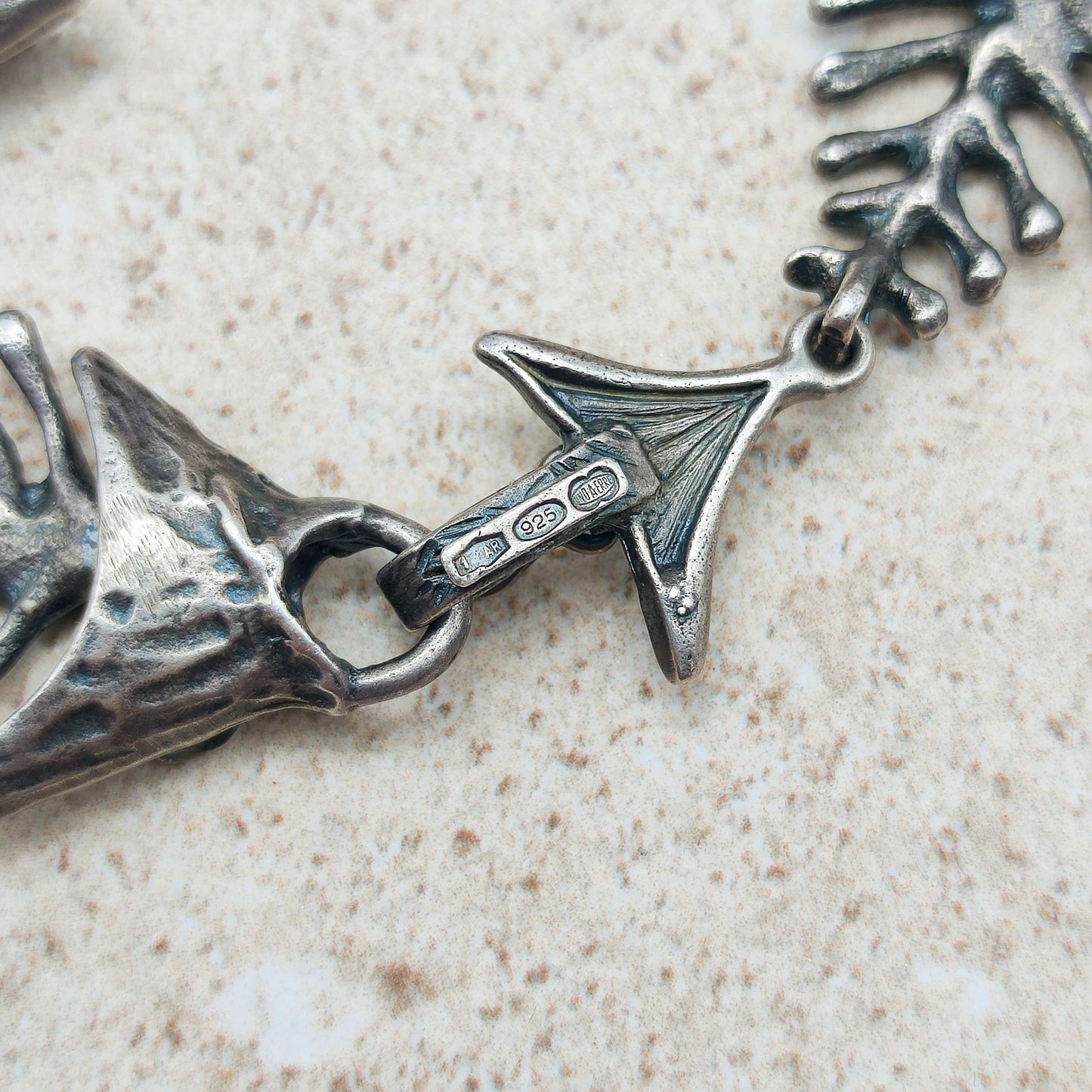 Silver Modernist fish bracelet by UnoAErre