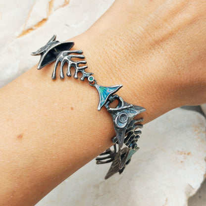 Silver Modernist fish bracelet by UnoAErre