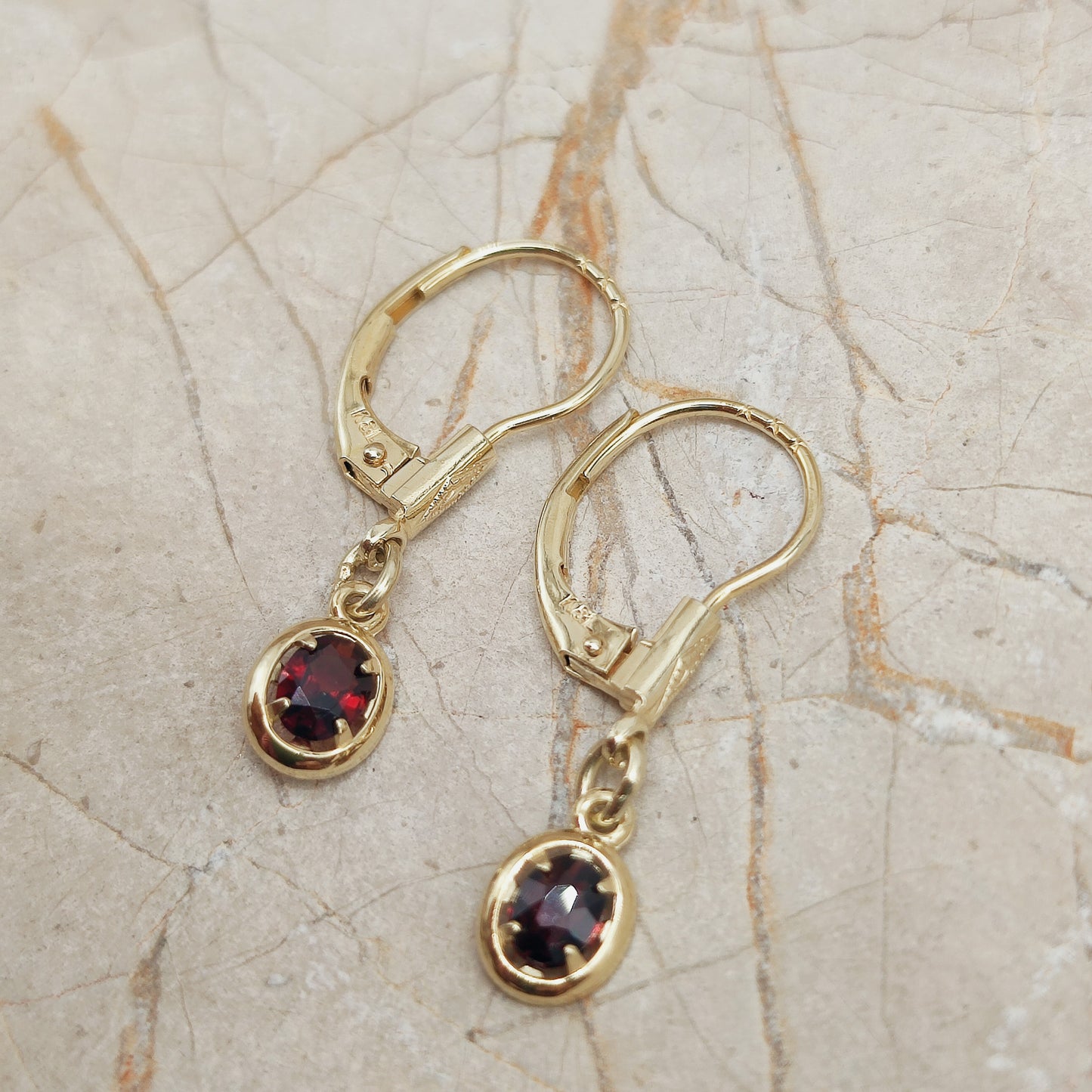 Elegant dangles with Garnet in 14K gold