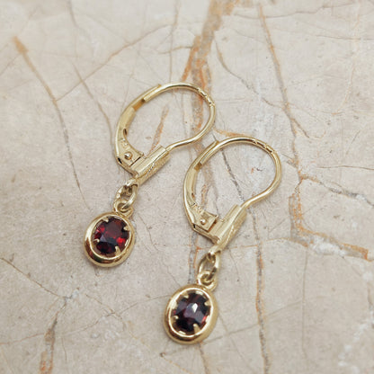 Elegant dangles with Garnet in 14K gold