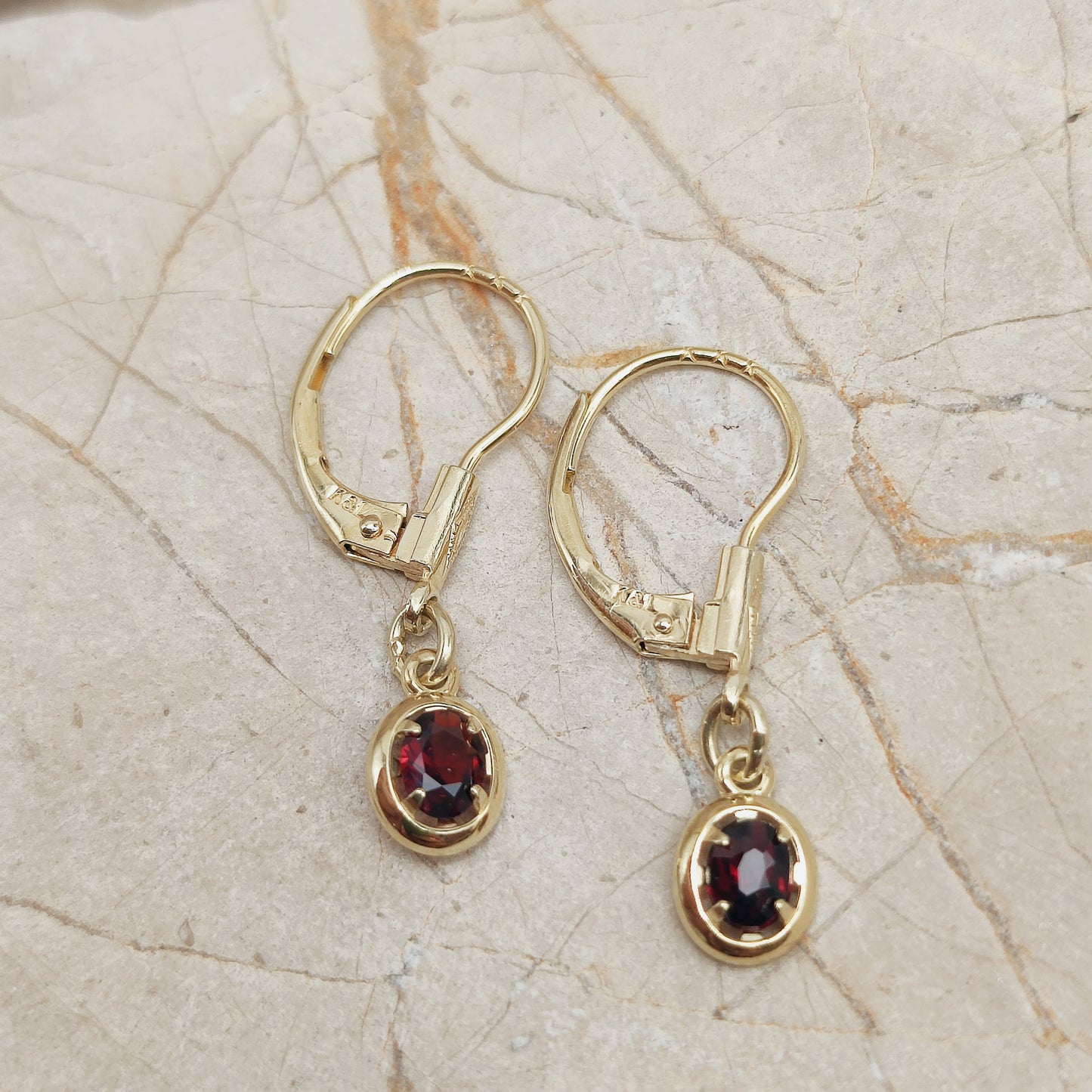 Elegant dangles with Garnet in 14K gold
