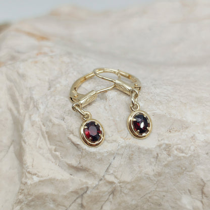 Elegant dangles with Garnet in 14K gold