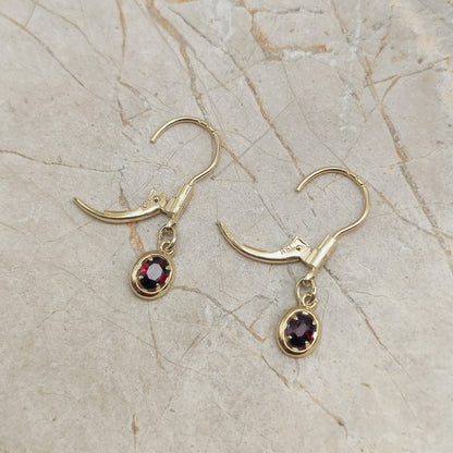 Elegant dangles with Garnet in 14K gold