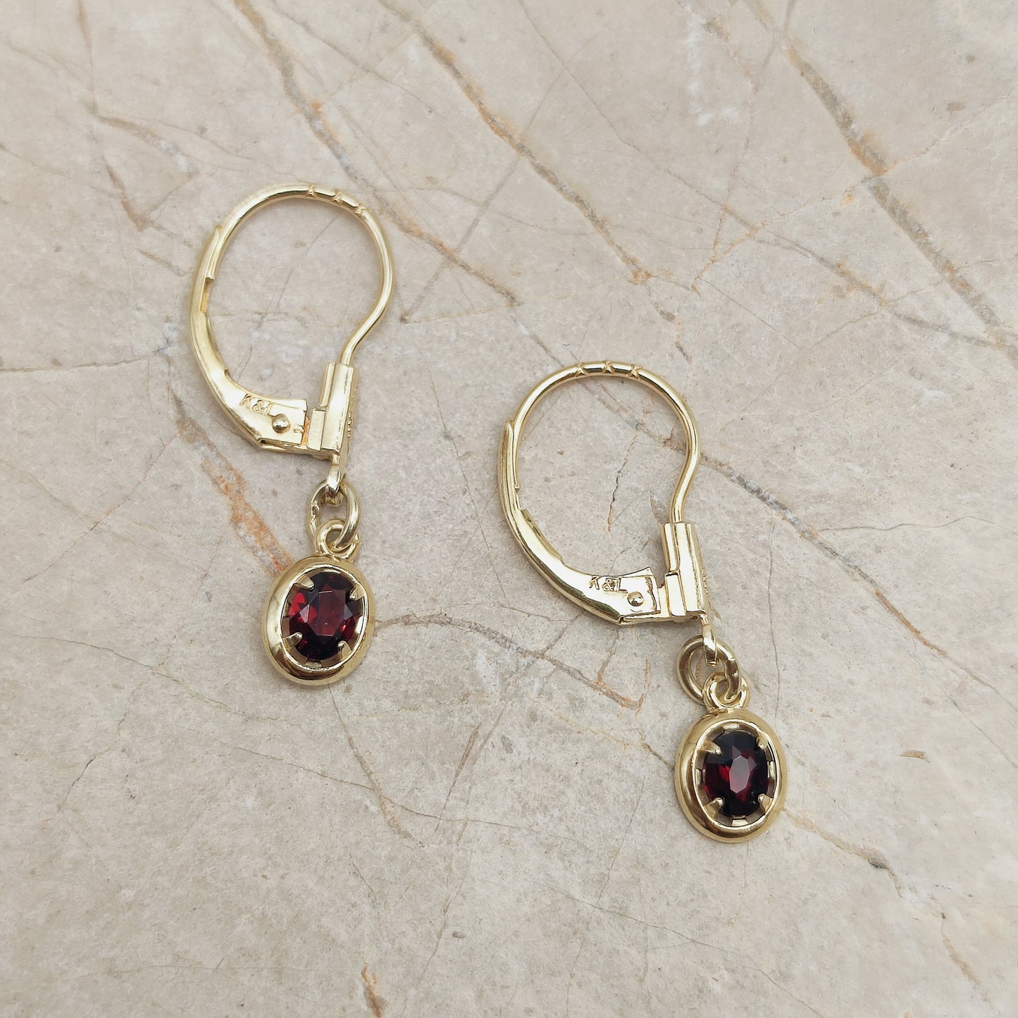 Elegant dangles with Garnet in 14K gold