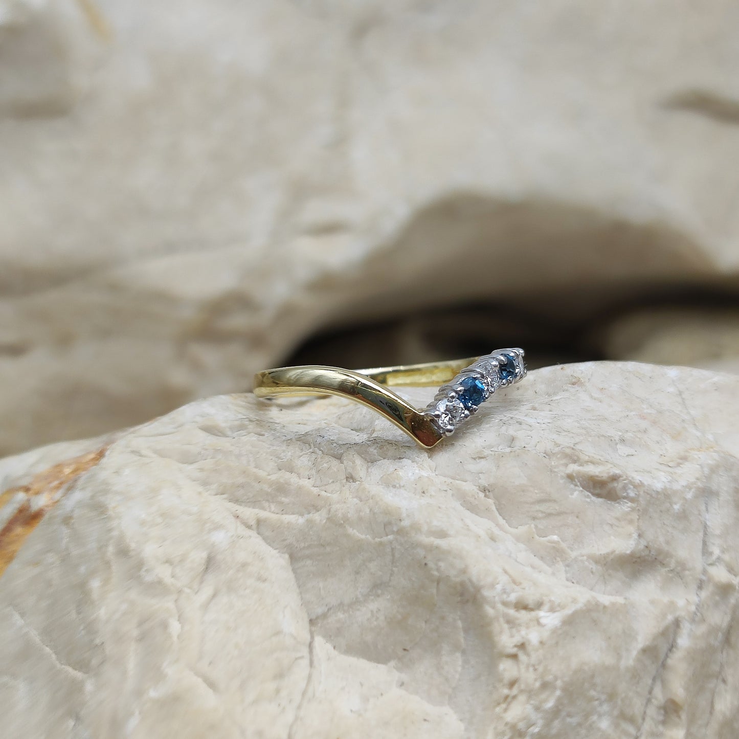 Vintage diamond and London Blue Topaz wishbone ring in 18K gold