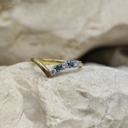 Vintage diamond and London Blue Topaz wishbone ring in 18K gold