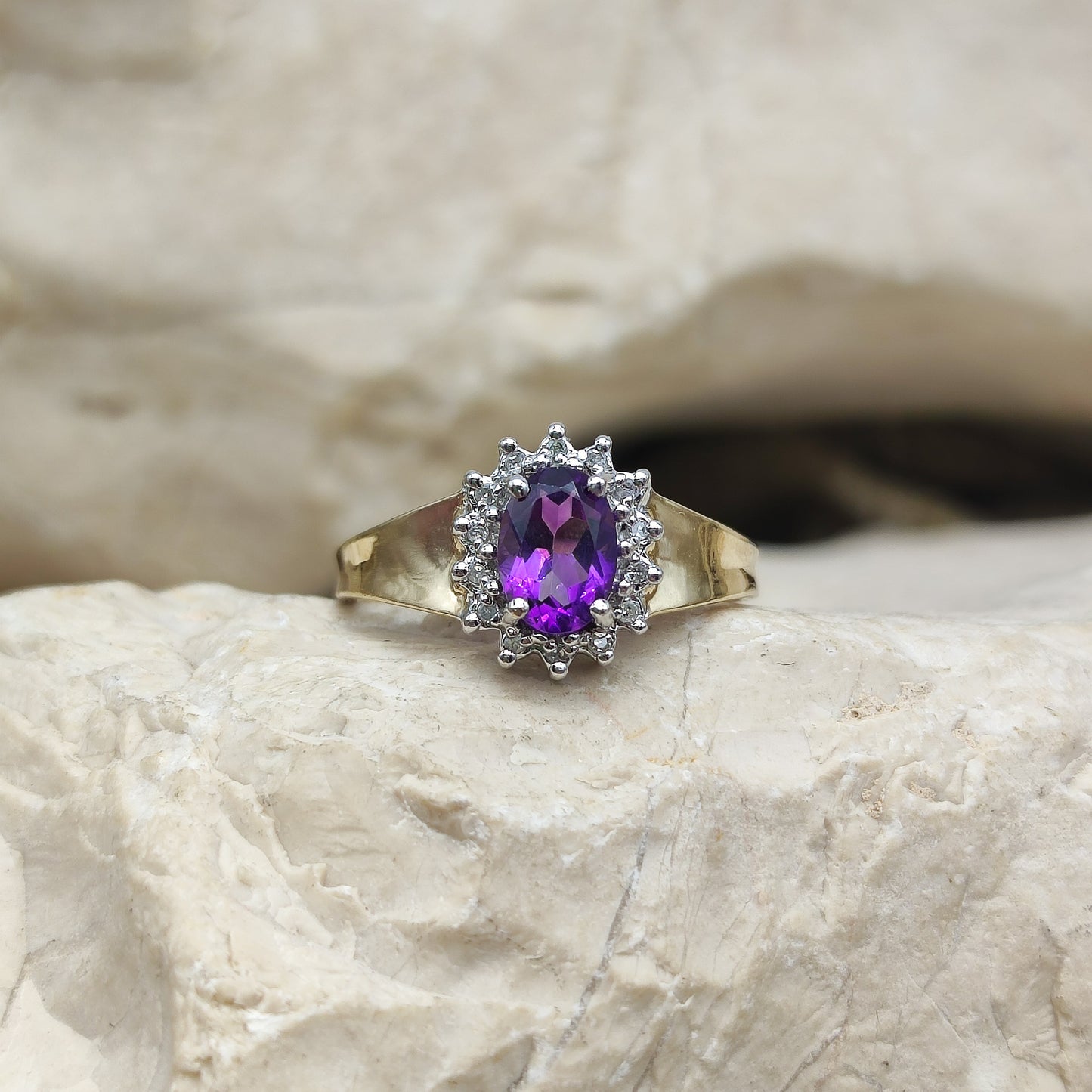 Amethyst and diamond halo ring in 9K gold