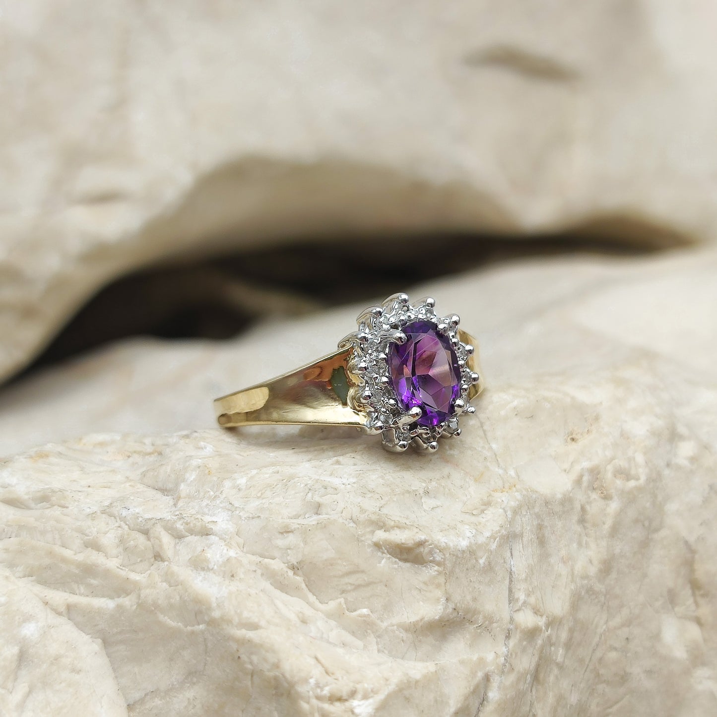 Amethyst and diamond halo ring in 9K gold