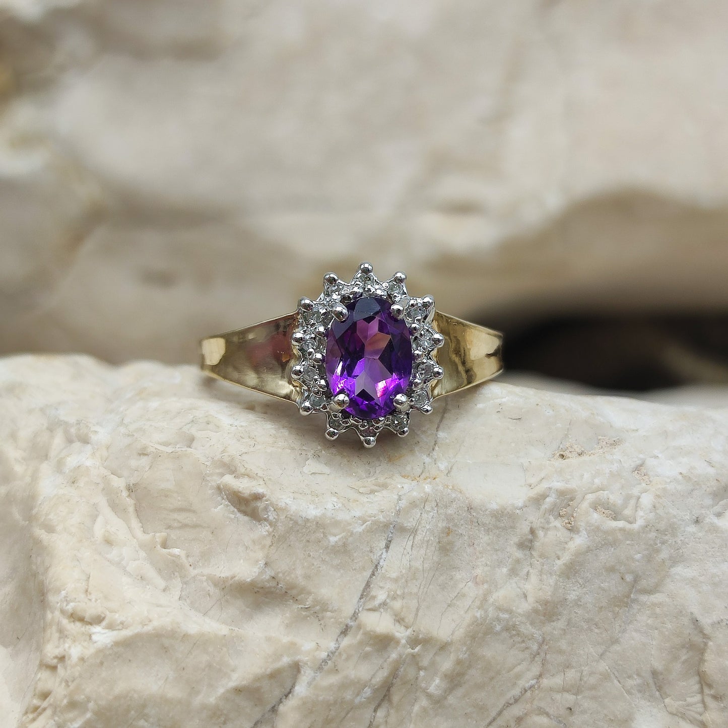 Amethyst and diamond halo ring in 9K gold