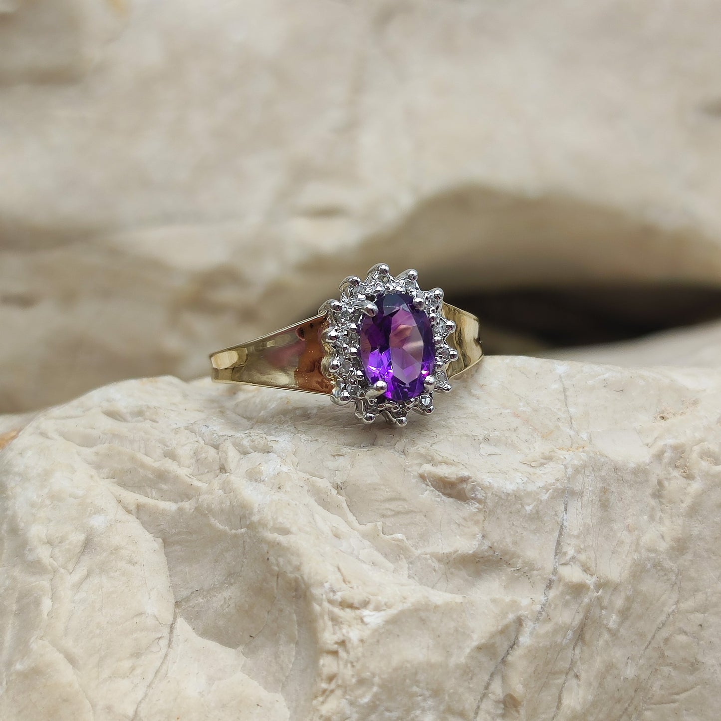 Amethyst and diamond halo ring in 9K gold