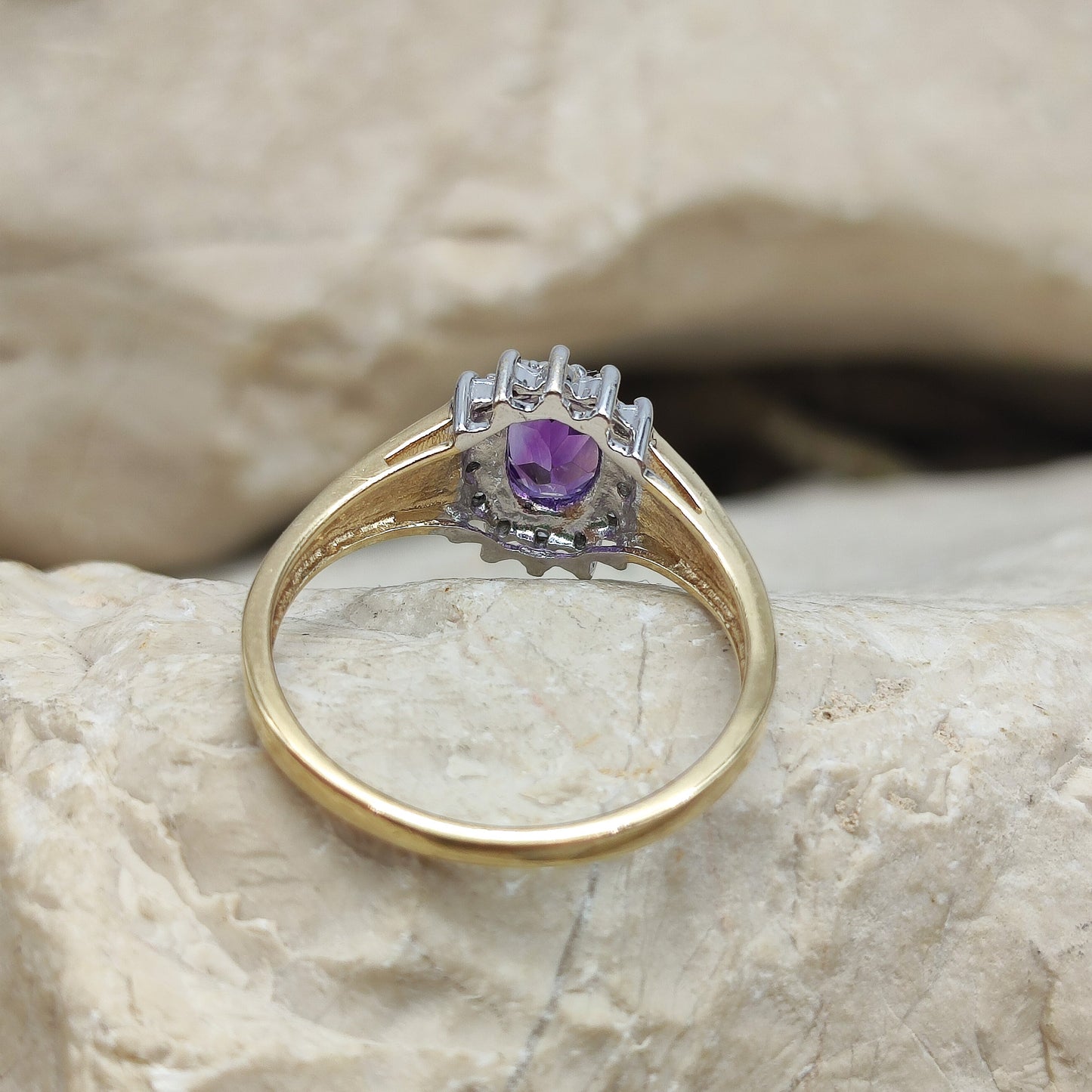 Amethyst and diamond halo ring in 9K gold